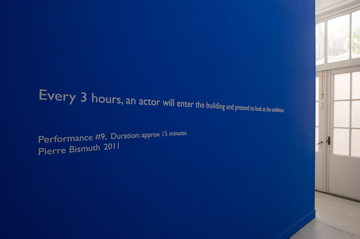 11.Performance #9, 2011. Matte white vinyl, letters on blue wall, Various dimensions, 15 minute approximate duration, Courtesy of the artist