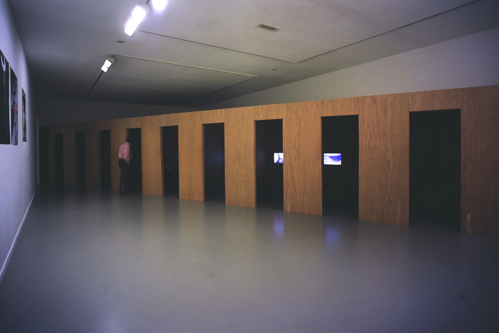 Zaaloverzicht video cabines in Amsterdam Revisited: A'dam & Eve: On sex, tolerance and other dependencies, 2002